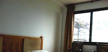 Mount Emei Jindingxiang Huaili Hotel Эмэйшань Экстерьер фото
